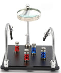 Go-To Magnetic Helping Hand With Four PCB Pillars And Three Magnifying Lamps on black base, featuring adjustable gooseneck arms.