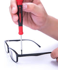 Adjusting glasses with Nine Piece Precision Screwdriver Set With Magnetic Tips And Swivel End Cap, ergonomic grip, chrome vanadium steel.