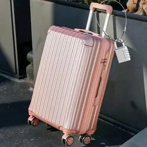 Pink suitcase secured with Five Pack Luggage Safety Cables, Braided Stainless Steel With Loops, 12 Inch Length, 2mm Thickness