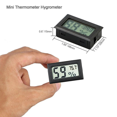 Hand holding Four Pack Mini Digital Temp And Humidity Meters With Probes, A 2 In 1 Thermometer Hygrometer With LCD Display