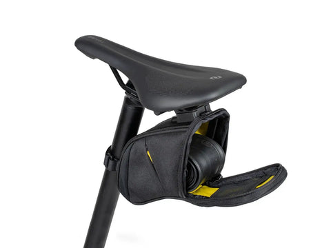Open Aero Wedge Pack DX Medium Under Saddle Bag 0.9 L Expanding Capacity With QuickClick F25 Mount revealing internal pockets