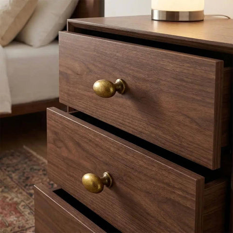 Oval Antique Brass Cabinet Knobs Set 1.6 Inch Zinc Alloy Drawer Knobs for Dresser on wooden drawers, vintage vibe finish.