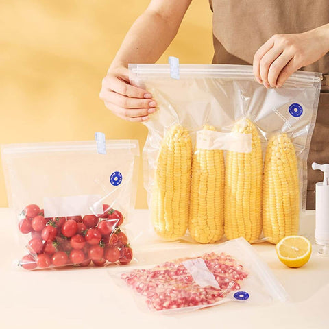 Person sealing food in vacuum bags with 30 Pack Vacuum Storage Bag Sealing Clips Quick Snap Zipper Grips, showing corn and tomatoes.