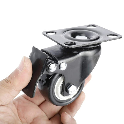 8 Pack 2 Inch Heavy Duty Swivel Plate Caster Wheels With Double Brake And PU Foam No Noise For Furniture Tables Trolleys Workbenches And Garage Use Each Caster Supports Up To 150 Lbs Durable Top Plate With Double Ball Bearing For Smooth Quiet Rolling, close-up view in hand