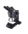 PSM-1000 Series Lab-Ready Compound Microscope With Upright Imaging, Apochromatic ELWD Optics, Parfocality Adjustment, ULWD And ELWD Objectives, 355-1064nm Illumination, Incident Light, Modular System For Real-World Lab Work. Black upright compound microscope with binocular eyepieces, stage, and objectives.