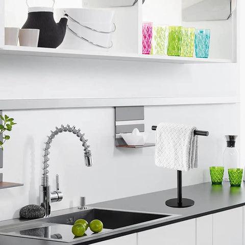 Hand Towel Holder Stand For Bathroom Vanity Countertop Matte Black Finish Free Standing Design Space Saving Movable T Shape Towel Bar Rack For Kitchen And Bath on a kitchen counter with a towel near a sink