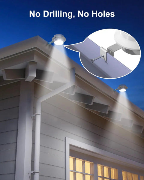 Eight Pack White Solar Powered Gutter Lights Outdoor Decorative Waterproof LED Fence Lamps attached to house gutter