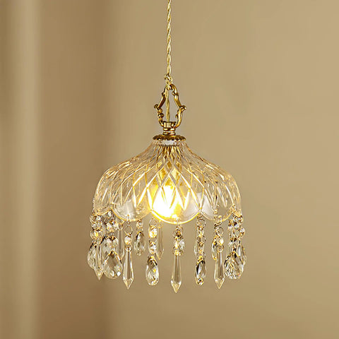 Top Shelf Vintage Crystal Pendant Light With Dope Diamond Cut Glass Shade And Legit Brass Accents Adjustable 0.5 To 70 Inch Cord hanging above illuminated interior.
