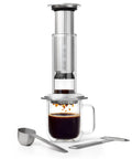 All In One Coffee Press With Glass Chamber, Stainless Steel And Aluminum Build, French Press Pour Over And Espresso Style Manual Brewer, 2 Minute Brew For Rich Flavor And Less Bitterness, Silver shown with cup and accessories