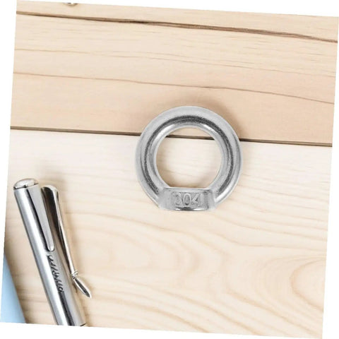 8 Pack M8 304 Stainless Steel Lifting Eye Nuts Heavy Duty Threaded Rigging Hardware With No Fuss Setup For Marine Hoisting And Industrial Job Site Work Built Tough attached to wood surface with 304 marking.