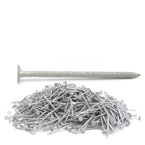 Pro Level Hot Dipped Galvanized Roofing Nails 2 1/2 Inch By 11 Gauge Featuring Killer Ring Shank Design and Wide Flat Head for Rock Solid Shingle Projects in 25 Lb Box with a pile of nails.