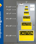 Front view of metal door with yellow CAUTION vinyl decals in multiple sizes for industrial notices.