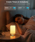 Lit RGBIC Smart Table Lamp 2 with touch control on nightstand by bed, woman sleeping, 64 scene modes, ideal bedroom use