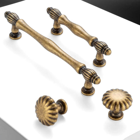 Antique Brass Cabinet Knobs One And A Quarter Inch Ten Pack Single Hole Drawer Pulls For Kitchen Cabinets Dressers Desks Bedroom Vanities Cupboards And Bathrooms Durable Rust Resistant Metal Hardware shown with elegant detailing.