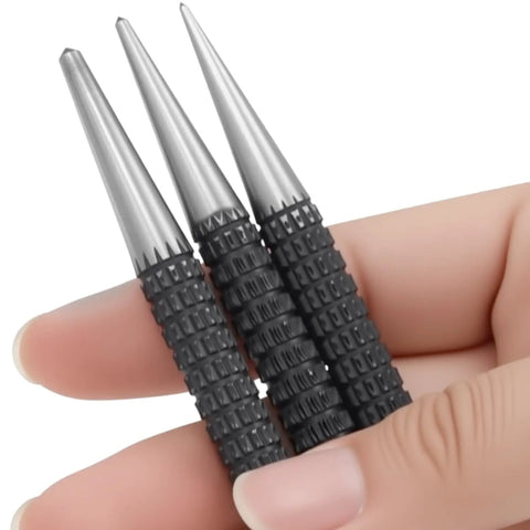 Three Nails It Dead On Center Punch Set With Knurled Grip Adjustable Spring Loaded Impact Tool held in hand.
