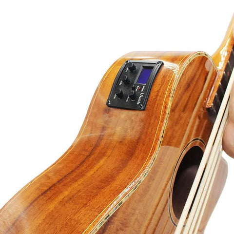 Three Band Piezo Ukulele Pickup Preamp With EQ And Tuner LCD Display mounted on a wooden ukulele body