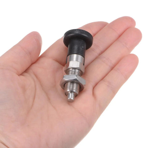 Kickass Stainless Steel Push Fit Ball Nose Spring Plunger M10x1 Thread With Slick 5mm Pin Diameter And Relentless Self Locking Design held in hand.
