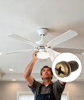 Technician installing Twenty Pack Ceiling Fan Blade Screws 1/4-20 X 3/8 Phillips Pan Head for secure fan mounting.