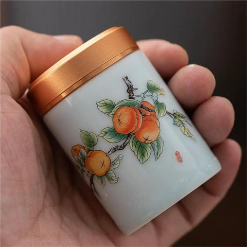 Top Tier Ceramic Food Storage Jars Set Of Twelve With Airtight Snap Lids For Spices Tea And Coffee Beans, Handheld design with orange fruit decoration.