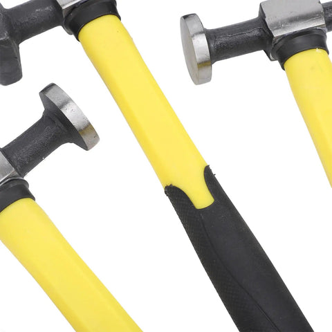 Close-up of hammers from 7 Piece Auto Body Repair Kit with Carbon Steel Hammer and Dolly Set for Car and Truck Dent Repair.