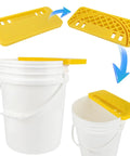 Beekeeping Honey Uncapping Tank Holder For Easy Harvesting And Frame Scraper, yellow ABS plastic, on white 5-gallon bucket