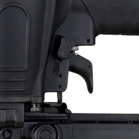 Go To Lightweight 16 Gauge Pneumatic Stapler with magnesium body, close-up of trigger and toggle fire modes, woodworking tool.