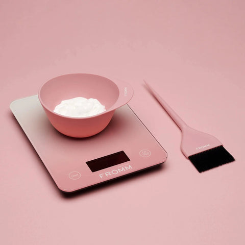 Digital Hair Color Scale For Precise Weighing Of Dyes And Developer with pink bowl and brush on pink background