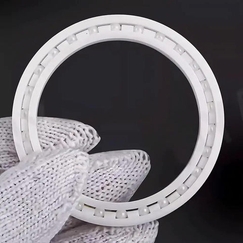 6810CE Zirconia Full Ceramic Thin Walled Bearings 50mm by 65mm by 7mm in hand, showcasing the high-quality ceramic material.
