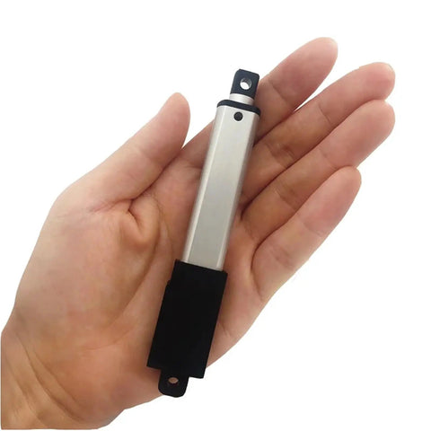 Hand holding 12V Small Linear Actuator With 30mm Stroke And 70N Load, compact aluminum motor for tight-space DIY projects