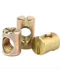 Close-up of slotted zinc-plated barrel nuts for furniture cross dowel set, heavy duty and strong joints for DIY woodworking projects.