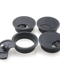 Four Piece Black Desk Grommet Covers Deliver Zero Stress Cable Control With Slick Adjustable Fit Top Shelf Abs Build seals for tidy cables.