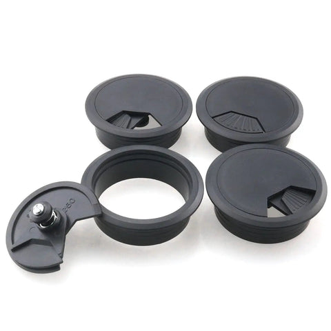 Four Piece Black Desk Grommet Covers Deliver Zero Stress Cable Control With Slick Adjustable Fit Top Shelf Abs Build seals for tidy cables.