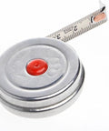 Heavy Duty Retractable Tape Measure With Self Locking Belt Loop Clip And Strong Magnetic Hook For Fast Woodworking Construction On Professional Job Sites And Home Outdoor Renovations, showing tape measure casing and extended tape.