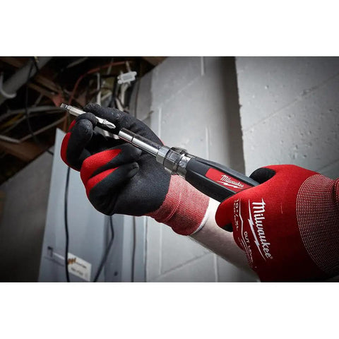 Hands holding Thirteen In One Cushion Grip Screwdriver Set With Eight Driver Bits And Four Nut Drivers for use