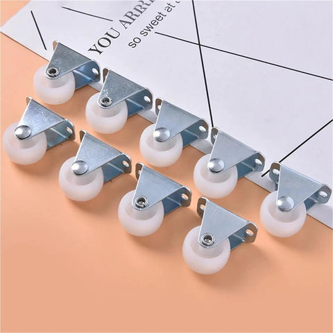 Six Piece Pack Of One Inch Universal Furniture Casters In Bright White Impact Resistant Nylon with silver plates on a flat surface.