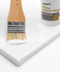 Premium White Texture Gesso 250ml For Artists Pro Grade Primer on canvas with brush, ideal for mixed media projects.