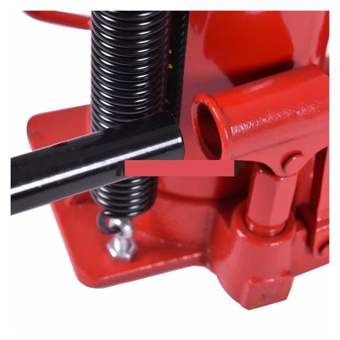 Kickass 20 Ton Hydraulic Air Bottle Jack Featuring Smooth Pumping Action And Damn Tough Stability For Effortless Auto Shop Upkeep And Heavy Gear Lifting Tasks close-up of the spring and handles.