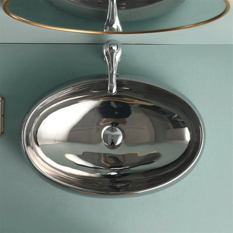 USZWBY Bathroom Vessel Sink European Ceramic Sink Art Basin Chrome Wash Basin Oval Sink showing polished silver design from above.