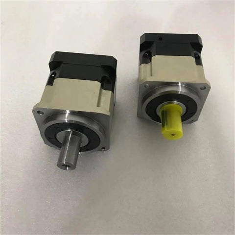 High Performance Hard Tooth Planetary Gear Reducer Delivering Rock Solid Torque Conversion And Absolute Zero Slop Action For Heavy Duty Speed Reduction Projects side view of two gearbox units with metal and plastic components.