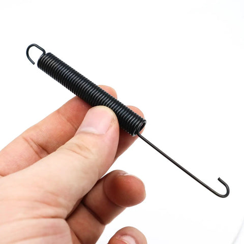 Close-up of Extension Spring 732-04460 Replacement for MTD Snowblower 2007-2017 C224 CA324 CA326 CA230 Two Pack in hand