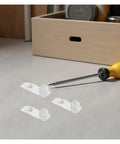 Clear Plastic Shelf Supports Locking Pins Set Of 60 For Cabinets And Shelves with screwdriver on table