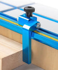 10 Pack One Quarter Inch Twenty Threaded Round Knobs For T Track And Jig Hardware installed on a blue aluminum track.