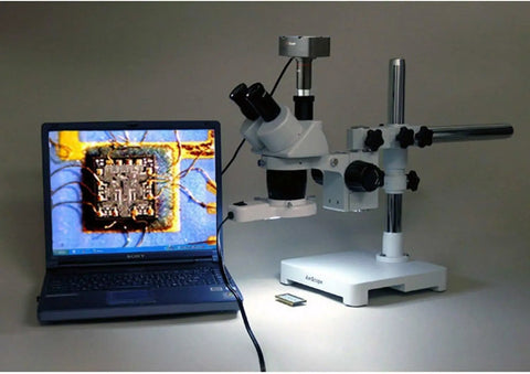 Trinocular Stereo Microscope With Boom Stand WH10X Eyepieces 20X And 40X Magnification 2X And 4X Objectives 8W Fluorescent Ring Light 110V To 120V Great For Home Or Classroom Use Hands On Inspections Of Biological Specimens Rocks Stamps Jewelry on boom stand with laptop display