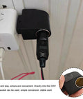 Knockout AC To DC Converter Turns 220V House Juice Into Smooth 12V Car Power With Zero Sweat Plug And Play Cigarette Lighter Adapter showing a compact design plugged into a socket.
