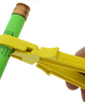 Ideal Industries 34-016 Large Fuse Puller For Heavy Duty Electrical Work in use, removing green 9/16 to 1 inch fuse with yellow grip.