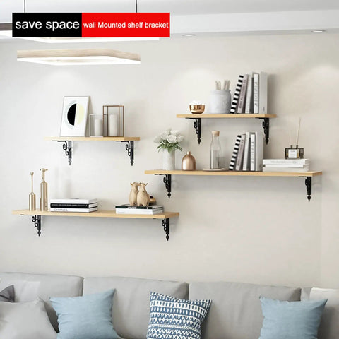 Heavy Duty L Shape Wall Mount Shelf Brackets With Screws Built Like A Tank Rock Solid Floating Shelf Support Smooth Iron Corner Bracket For Garage Or Home Black 11Point4 Inch Pack installed on a wall with wooden shelves.