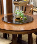 Dope Tempered Glass Lazy Susan Rotating Turntable on dining table with plant centerpiece, 60–110 cm diameter, 360-degree serving.