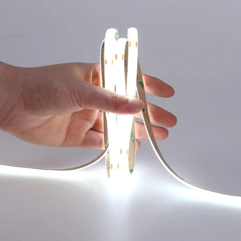 Hand holding 5V USB COB LED Strip Light With 640 LEDs, 6.6Ft IP65 Waterproof, Dimmable Cool White 6000K, flexible tape light active