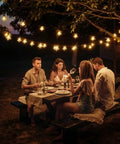 33 Ft 100 LED Star Fairy String Lights With Remote And Timer For Indoor And Outdoor Use Warm White Waterproof Decor illuminating an outdoor dinner