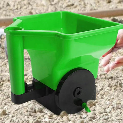 Green portable lightweight lawn care tool, 3L handheld fertilizer spreader, for lawns and gardens, adjustable broadcast spreader.